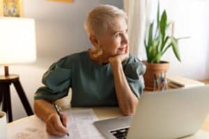 A woman filling out an acord 28
