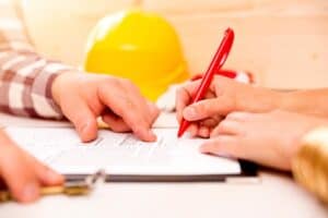 insurance document being signed by a contractor