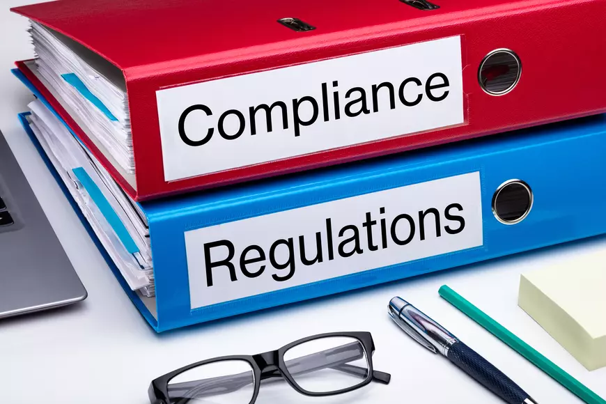 What is regulatory compliance in construction