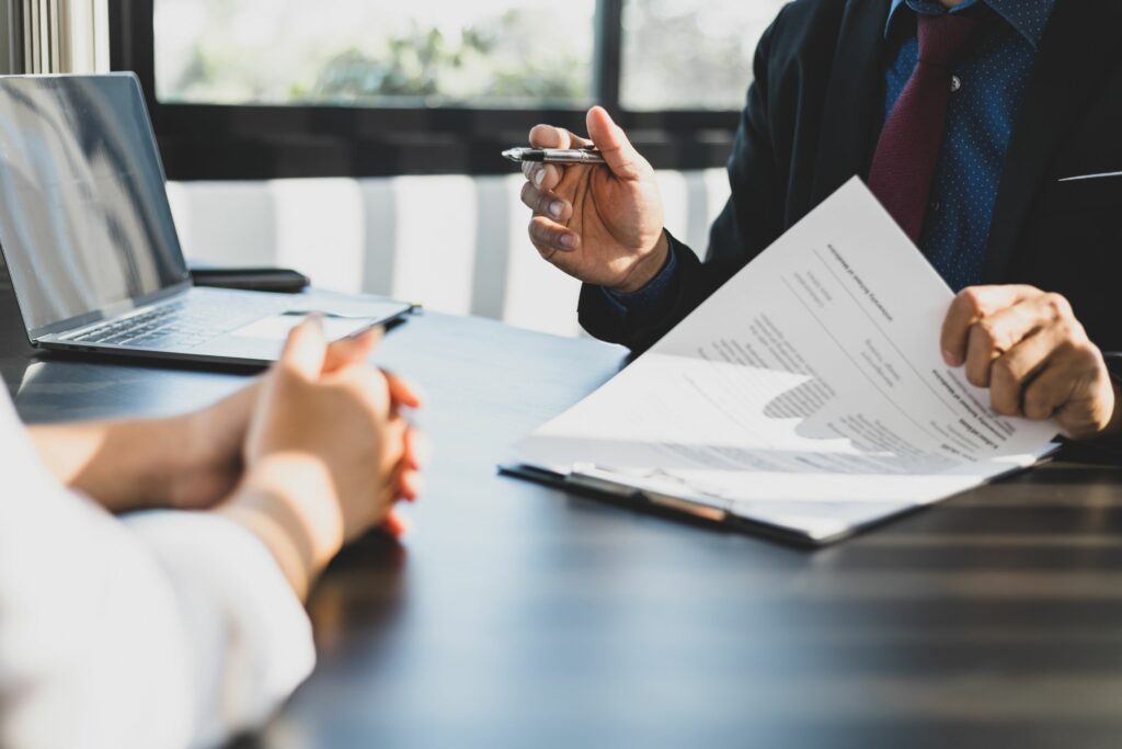 people discussing an insurance certificate for a business 